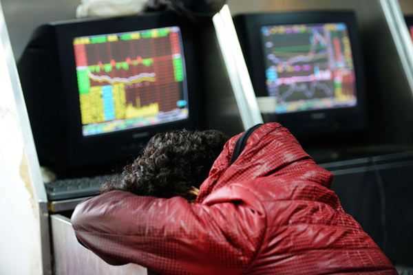 An investor in the Shanghai Market (China Daily)